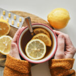 top-view-of-cup-of-tea-and-blister-of-pills-2022-01-19-00-09-39-utc-1